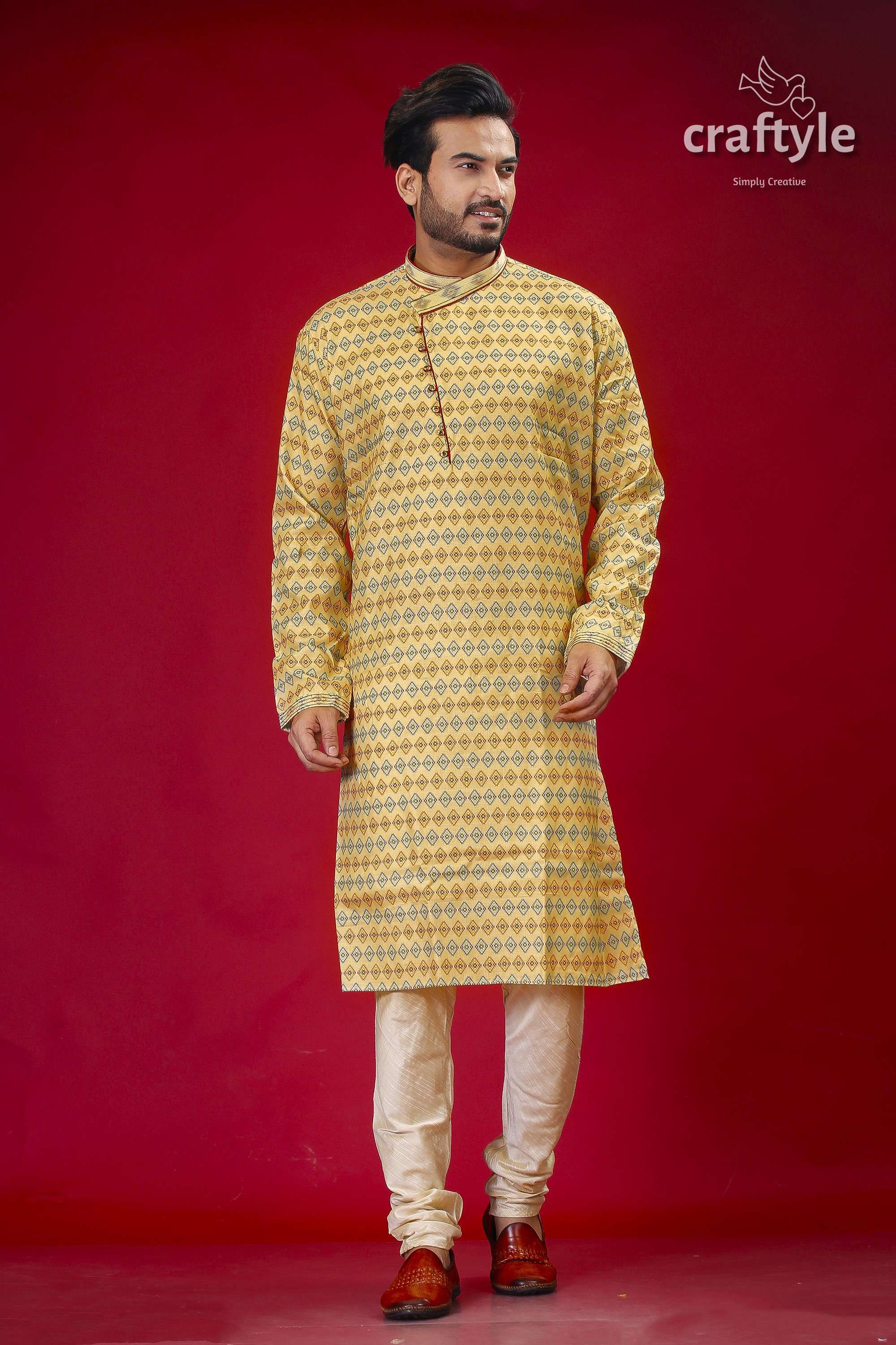 a man standing in front of a red background