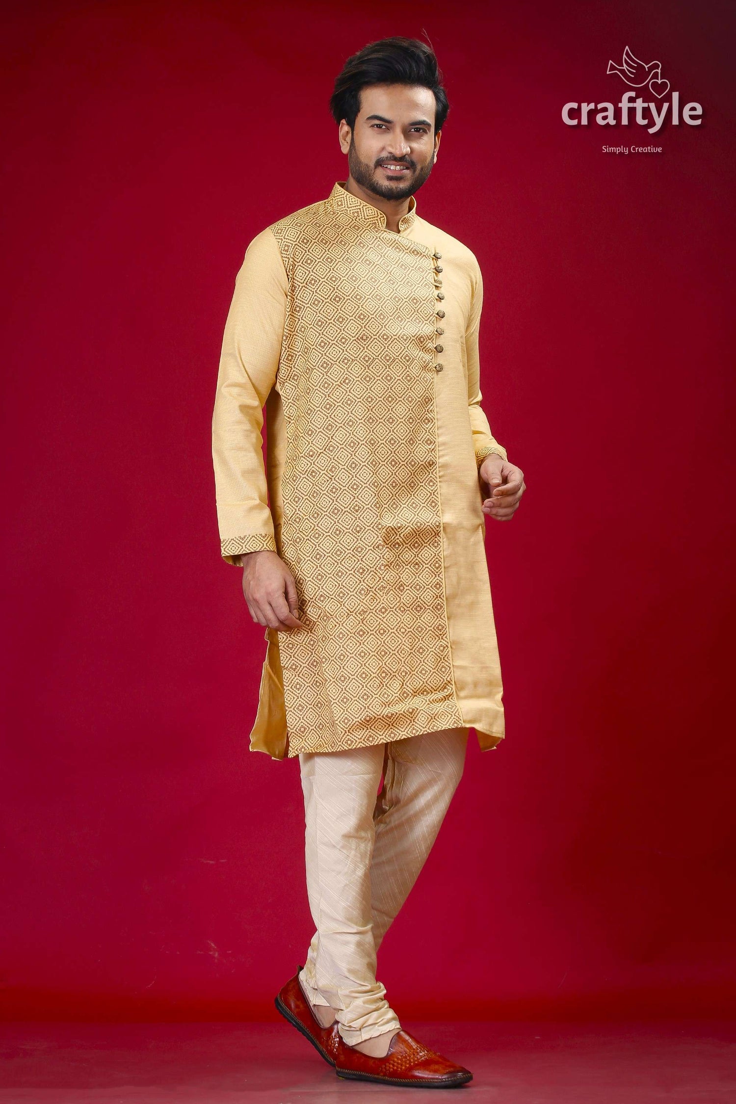 a man in a yellow indian outfit