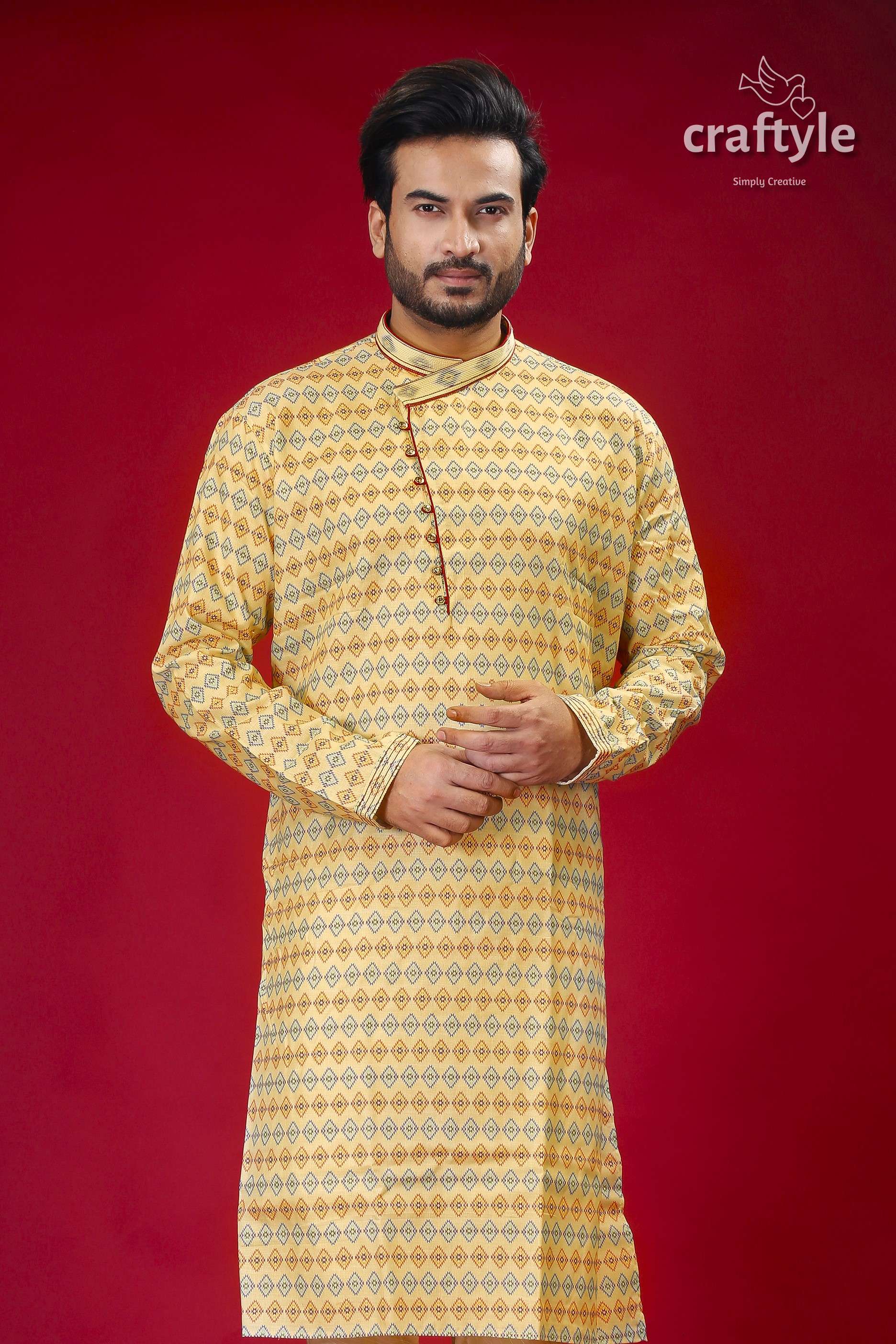 a man standing in front of a red background