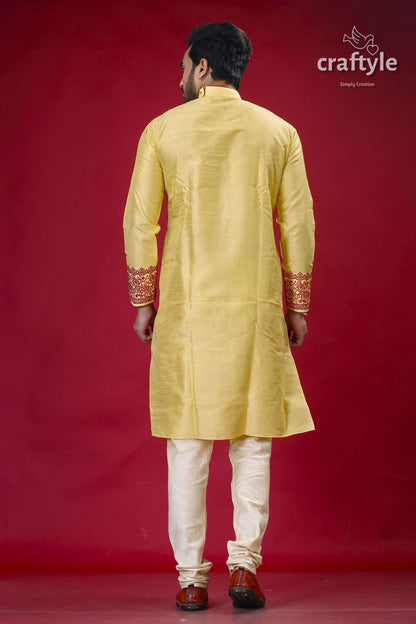 a man in a yellow indian outfit