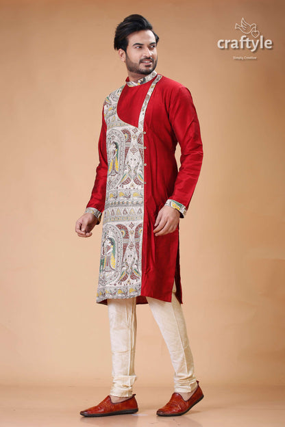 a man in a red and white indian outfit