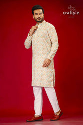 a man in a traditional indian outfit