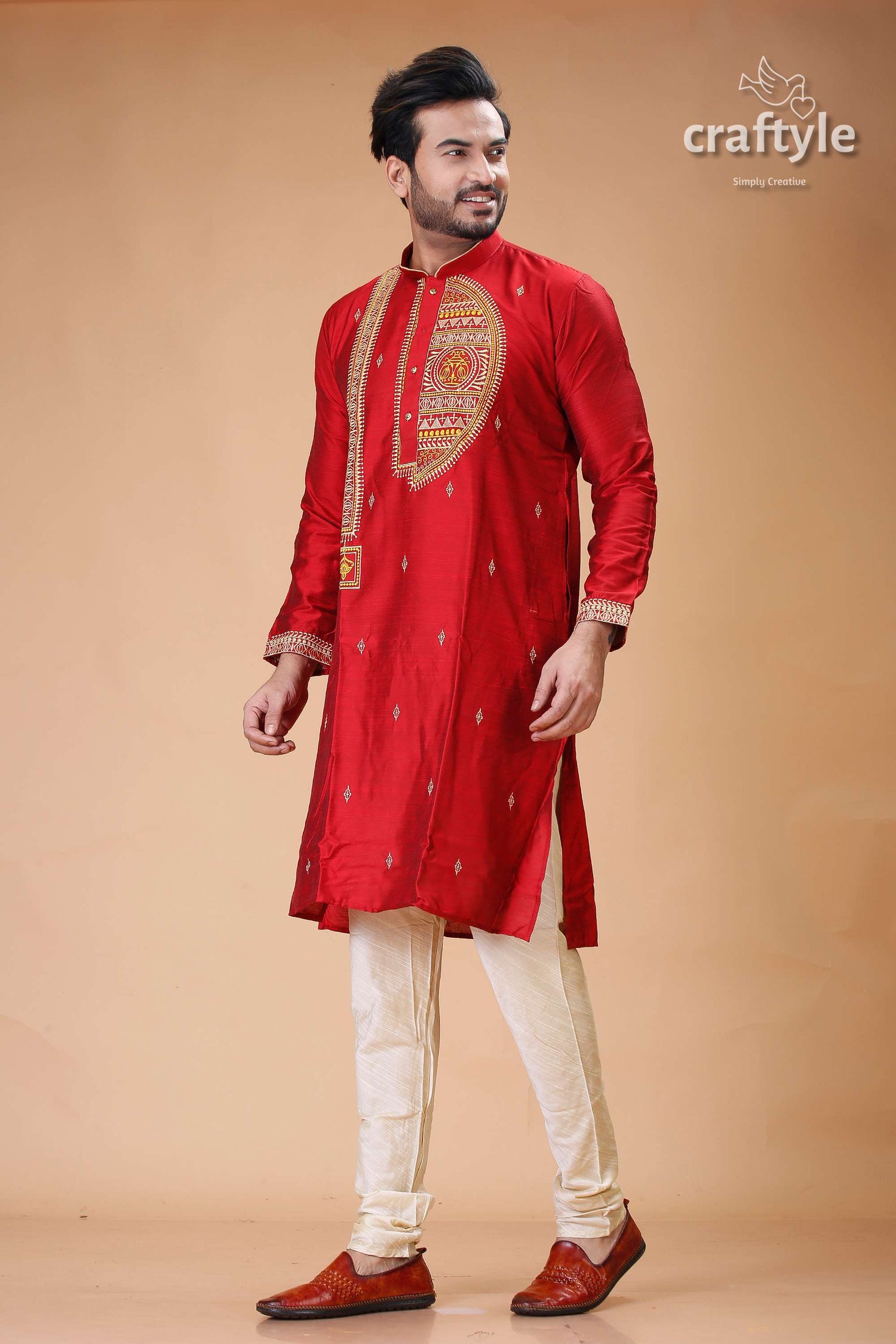 a man in a red indian outfit