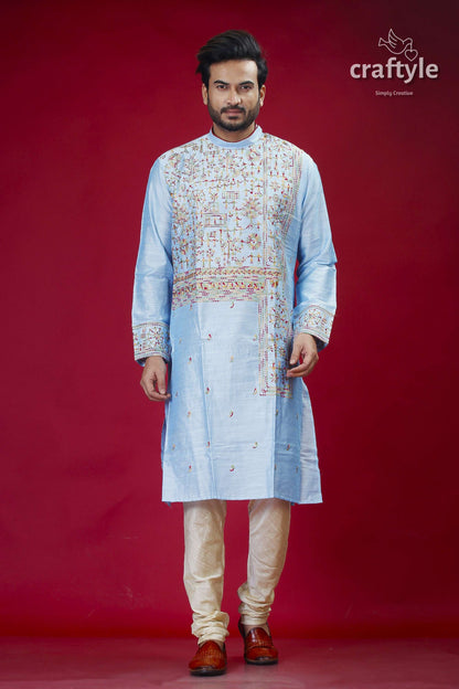 a man standing in front of a red background